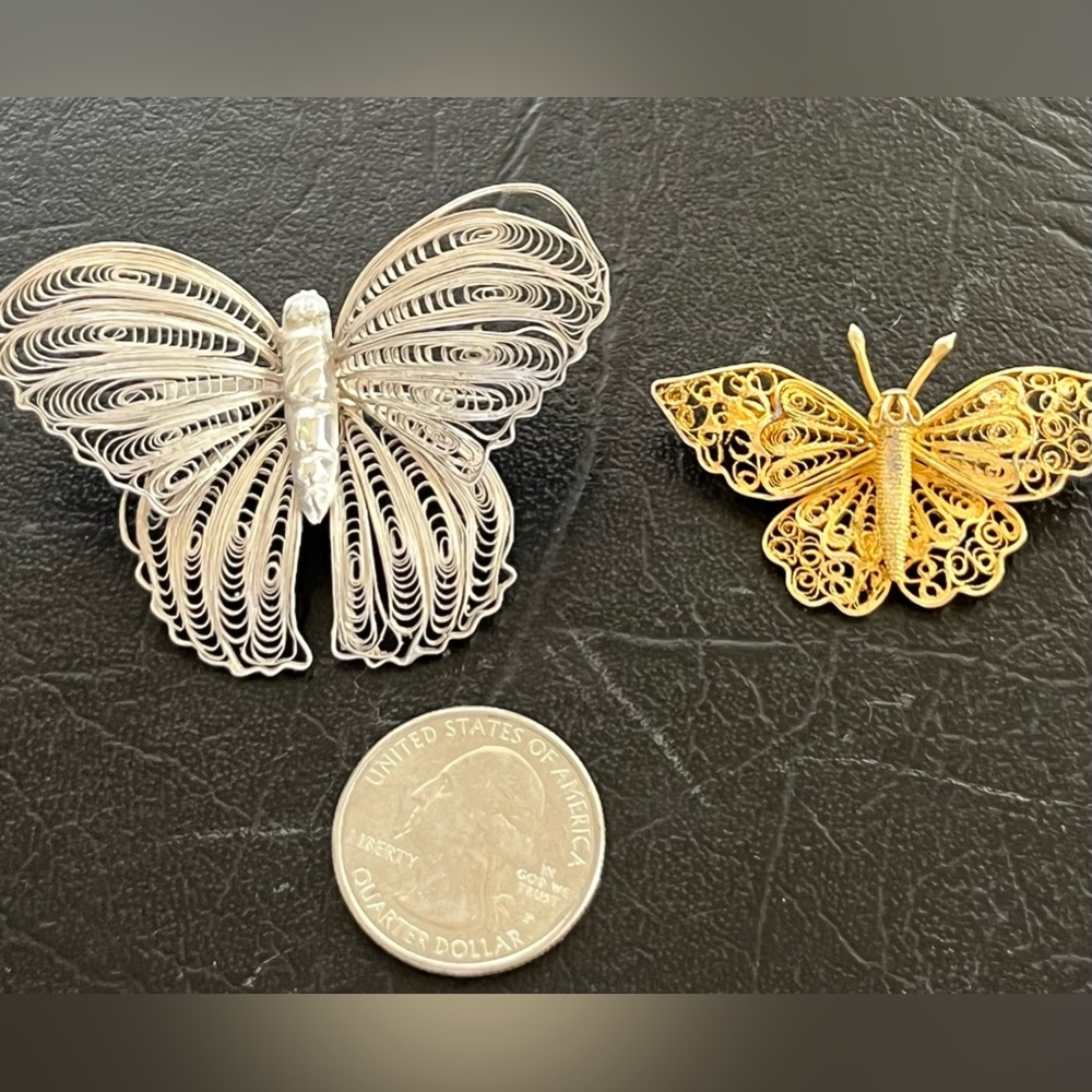 Sterling silver brooches